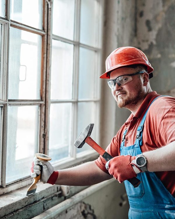 builder-on-a-construction-site-working-on-a-brick-resize.jpg