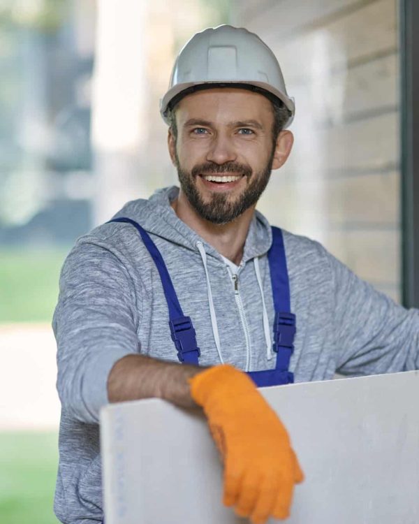 portrait-of-handsome-young-male-builder-in-hard-hat-looking-positive.jpg